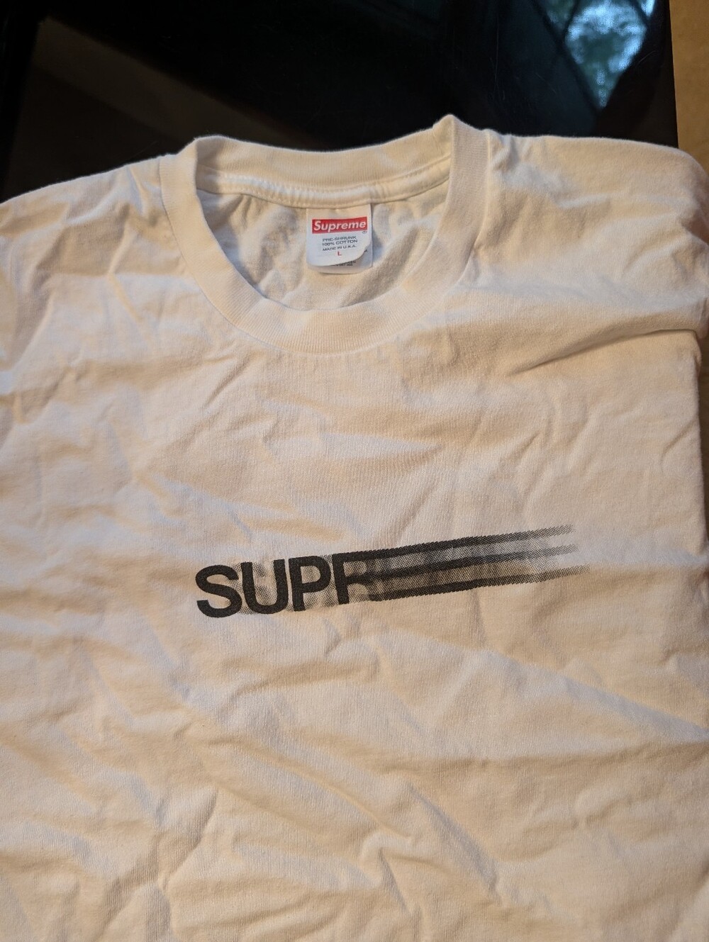 Supreme White Tee with Black 'SUPER' Vertical Graphic